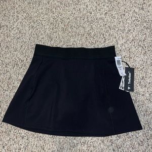 NWT TnaSlick court micro skirt
